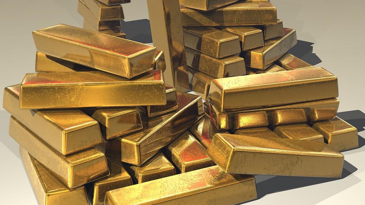 Груда золотых слитков Груда золотых слитков