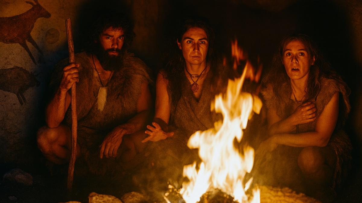 Люди каменного века у костра